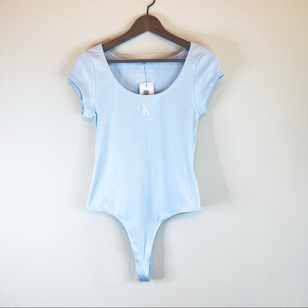 Calvin Klein Jeans Monogram Logo Tee Bodysuit Light Blue Size Medium NWT